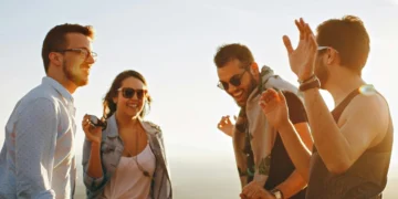 friends enjoying beach walk