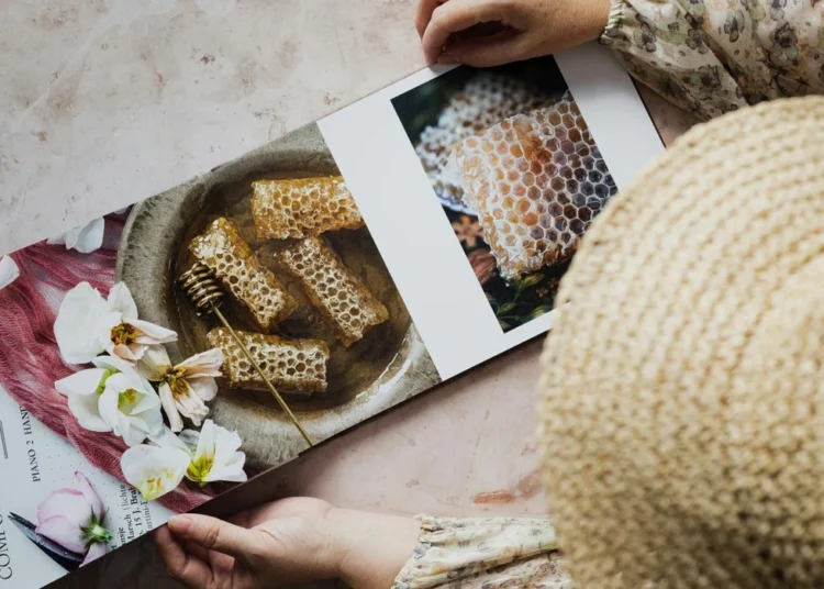 Hands holding magazine