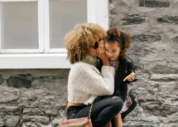 Mother hugging child