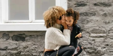 Mother hugging child
