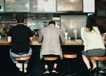 people sitting at bar