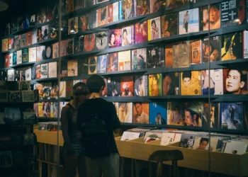 shoppers browsing record wall