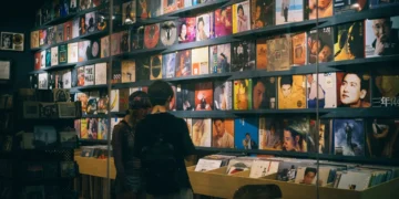 shoppers browsing record wall