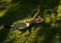 Woman lying on grass