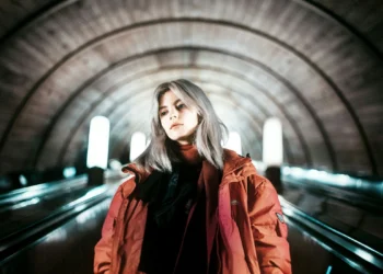 woman standing tunnel