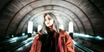 woman standing tunnel